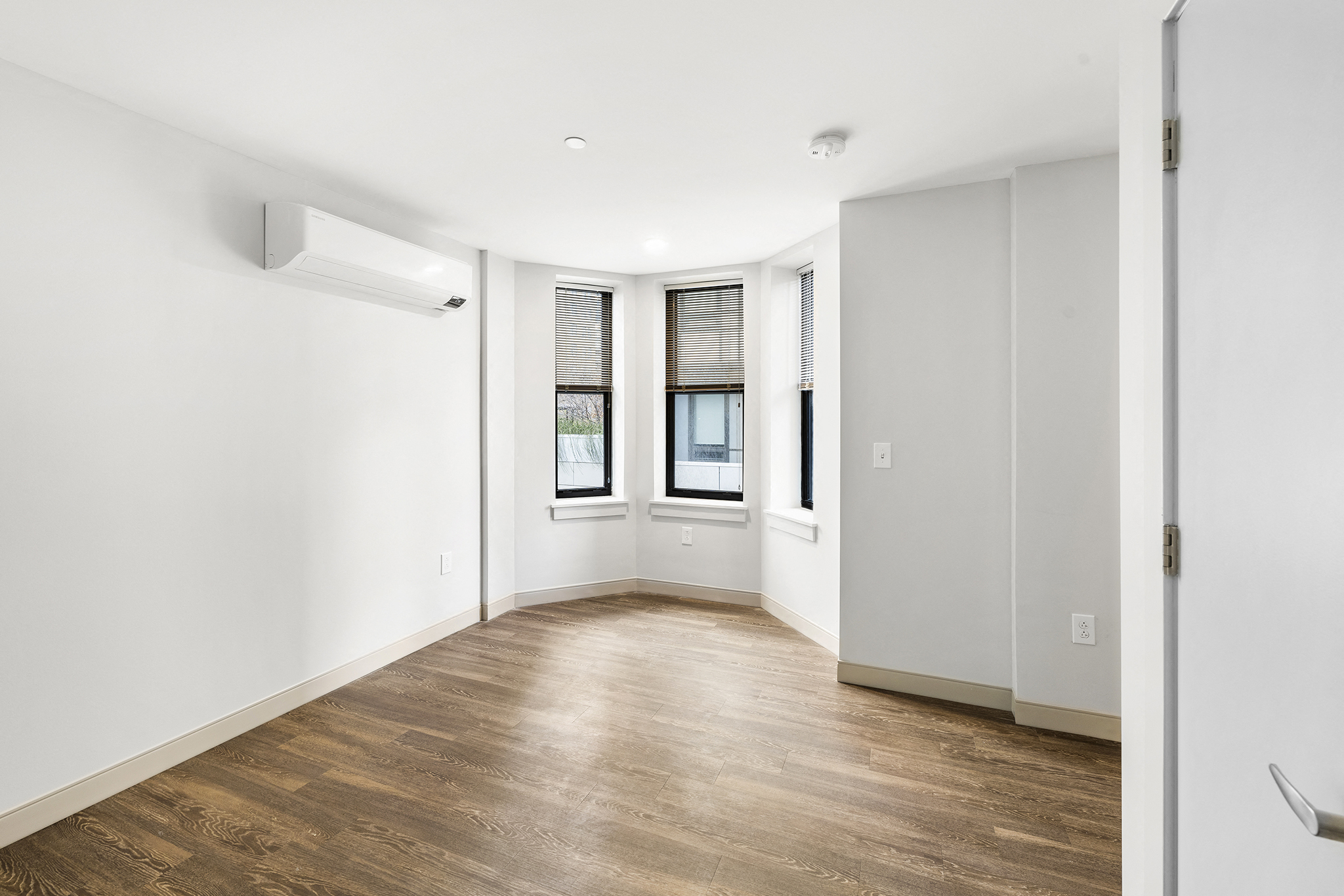 B1 Bedroom with Windows and AC unit,C1 Living Space
